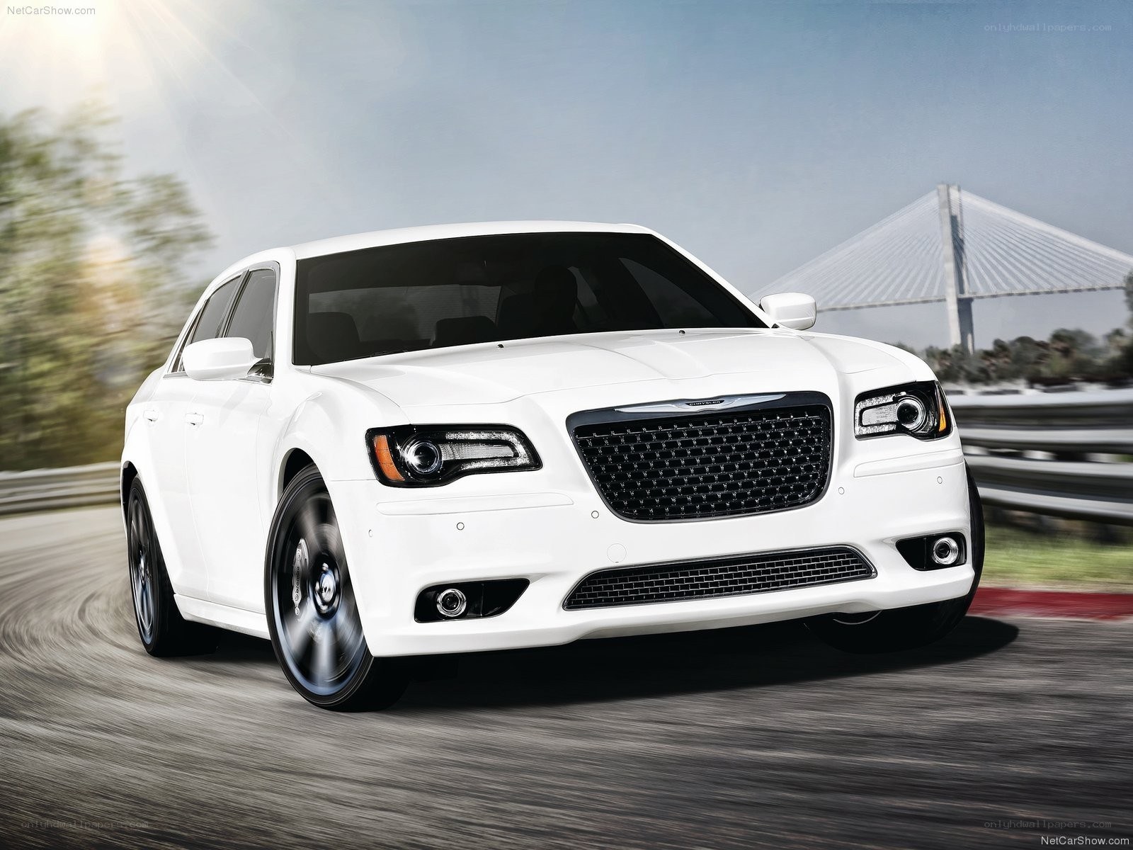 white chrysler 300 in motion