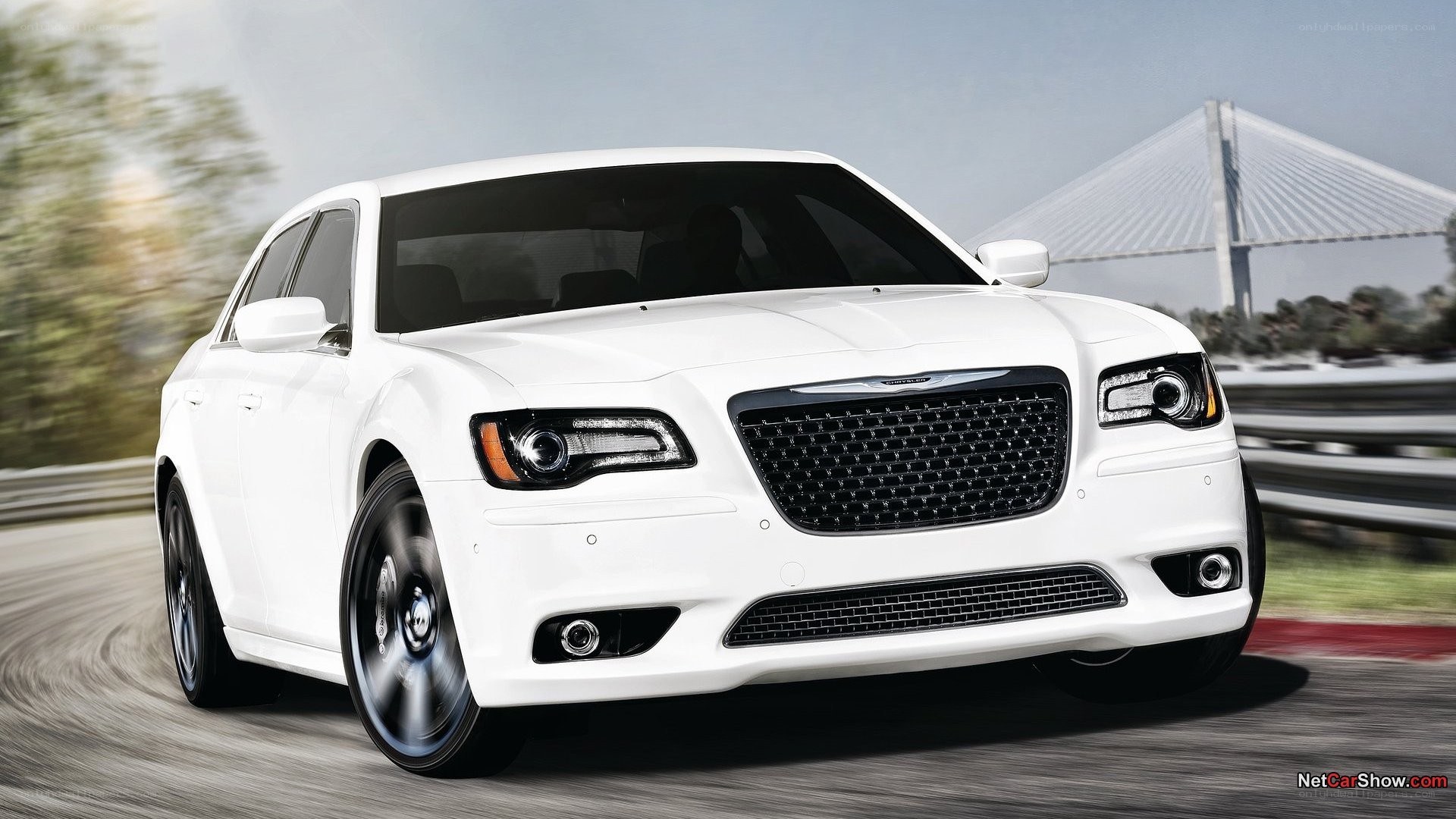white chrysler 300 in motion
