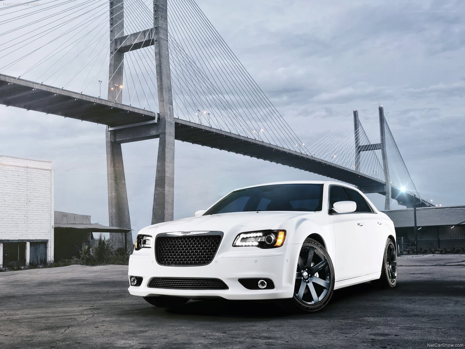White Chrysler 300 on a bridge
