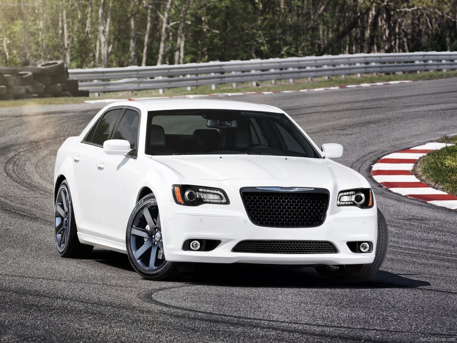 white chrysler 300 on racetrack