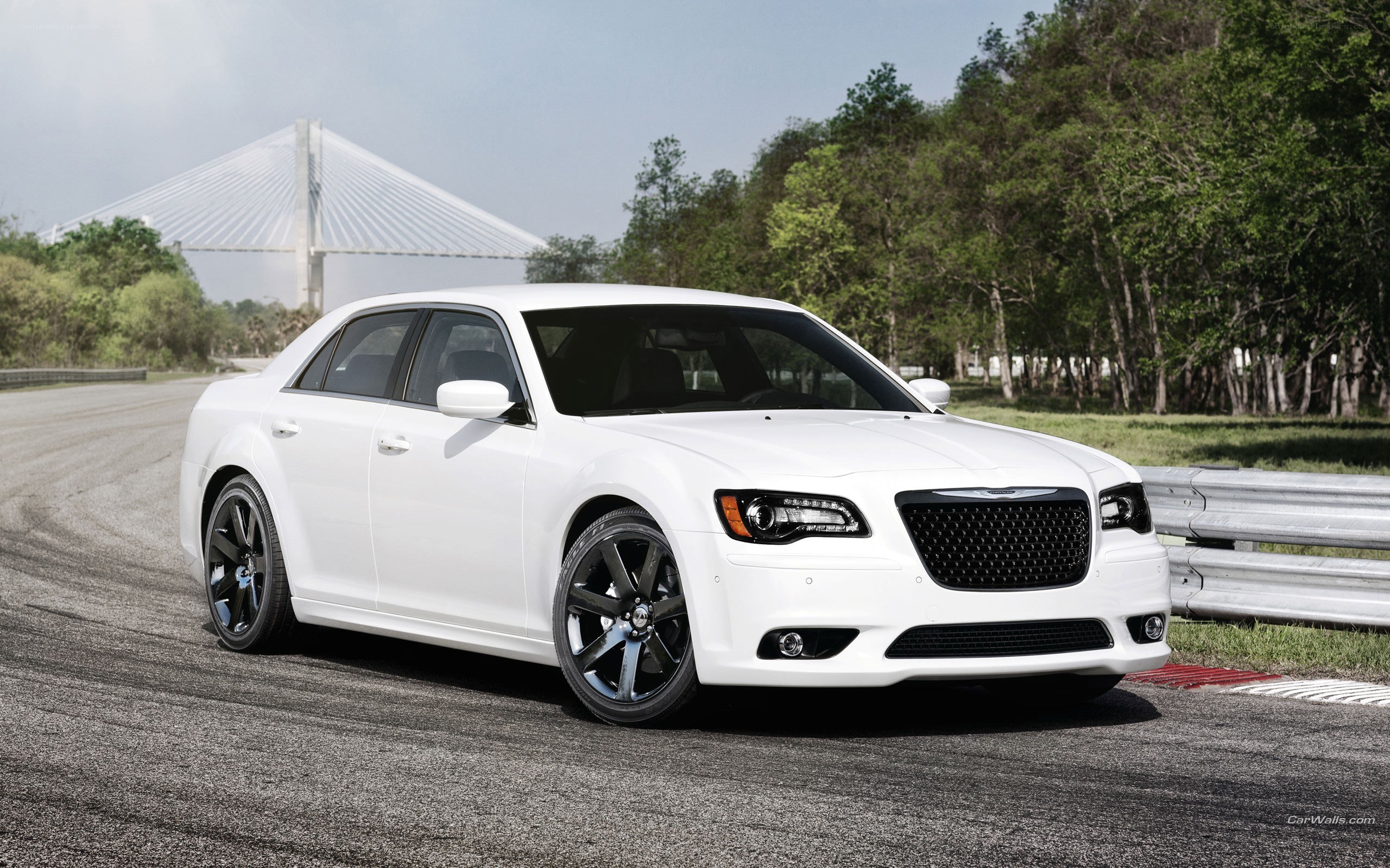 white chrysler 300 on racetrack