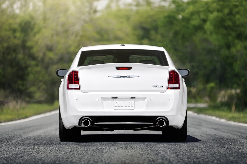 white chrysler 300 on road