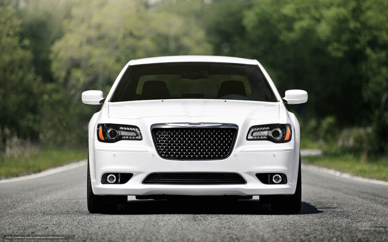 white chrysler 300 on road