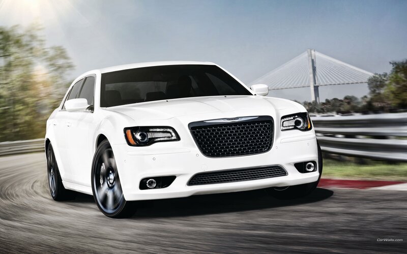 white chrysler on a racetrack
