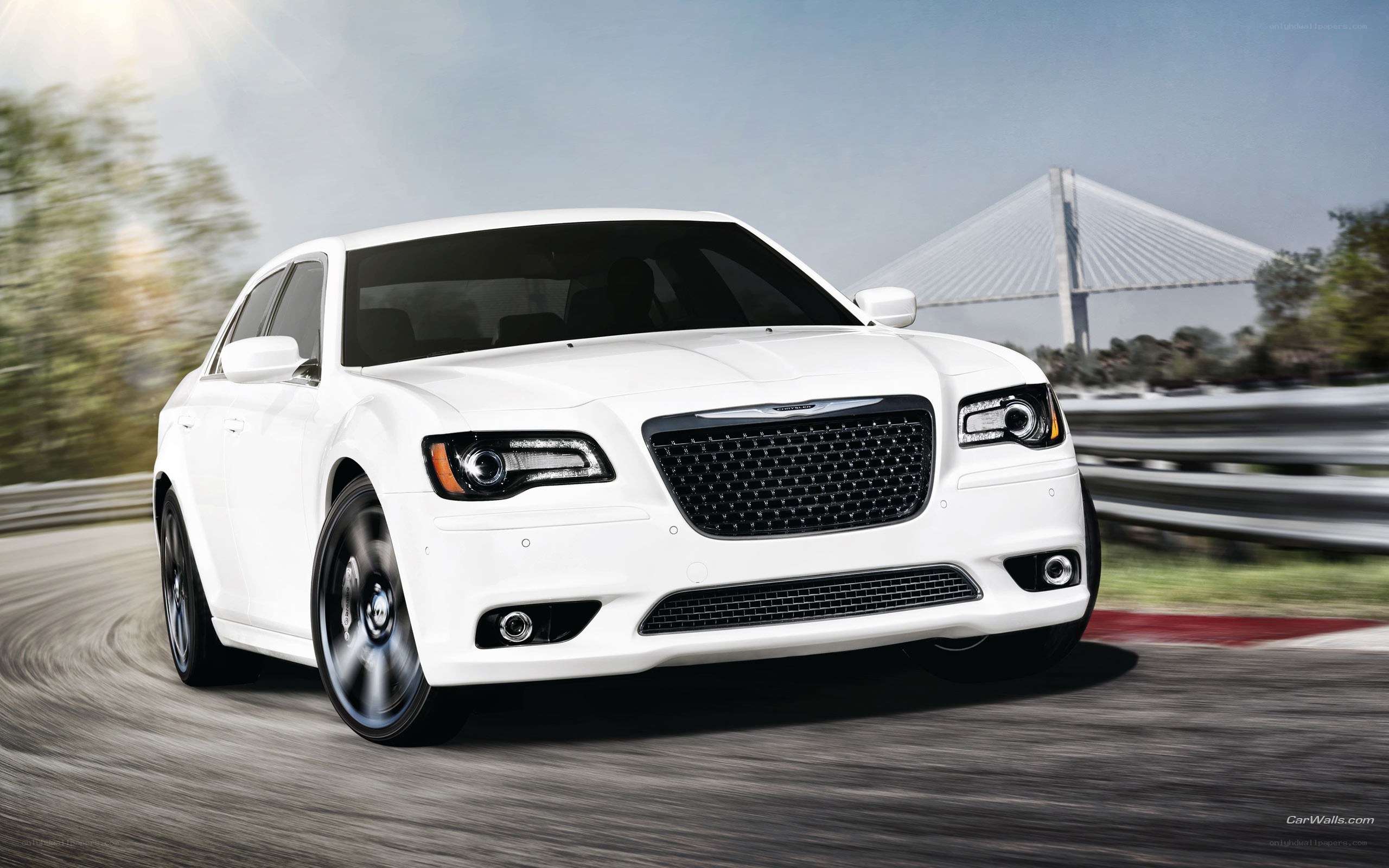 white chrysler on a racetrack