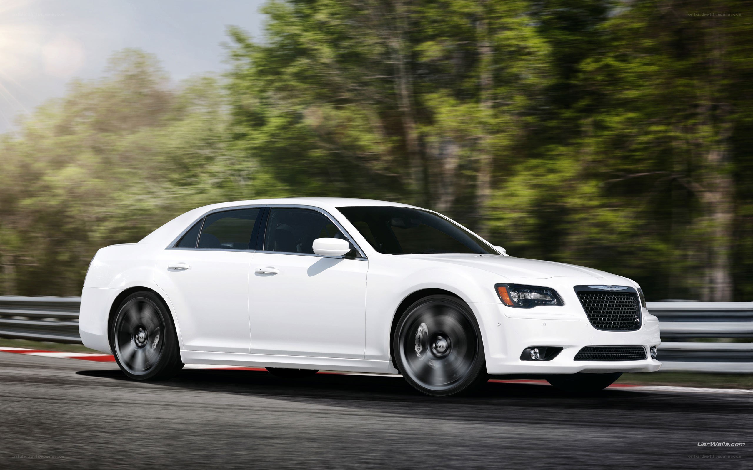 white chrysler on a racetrack