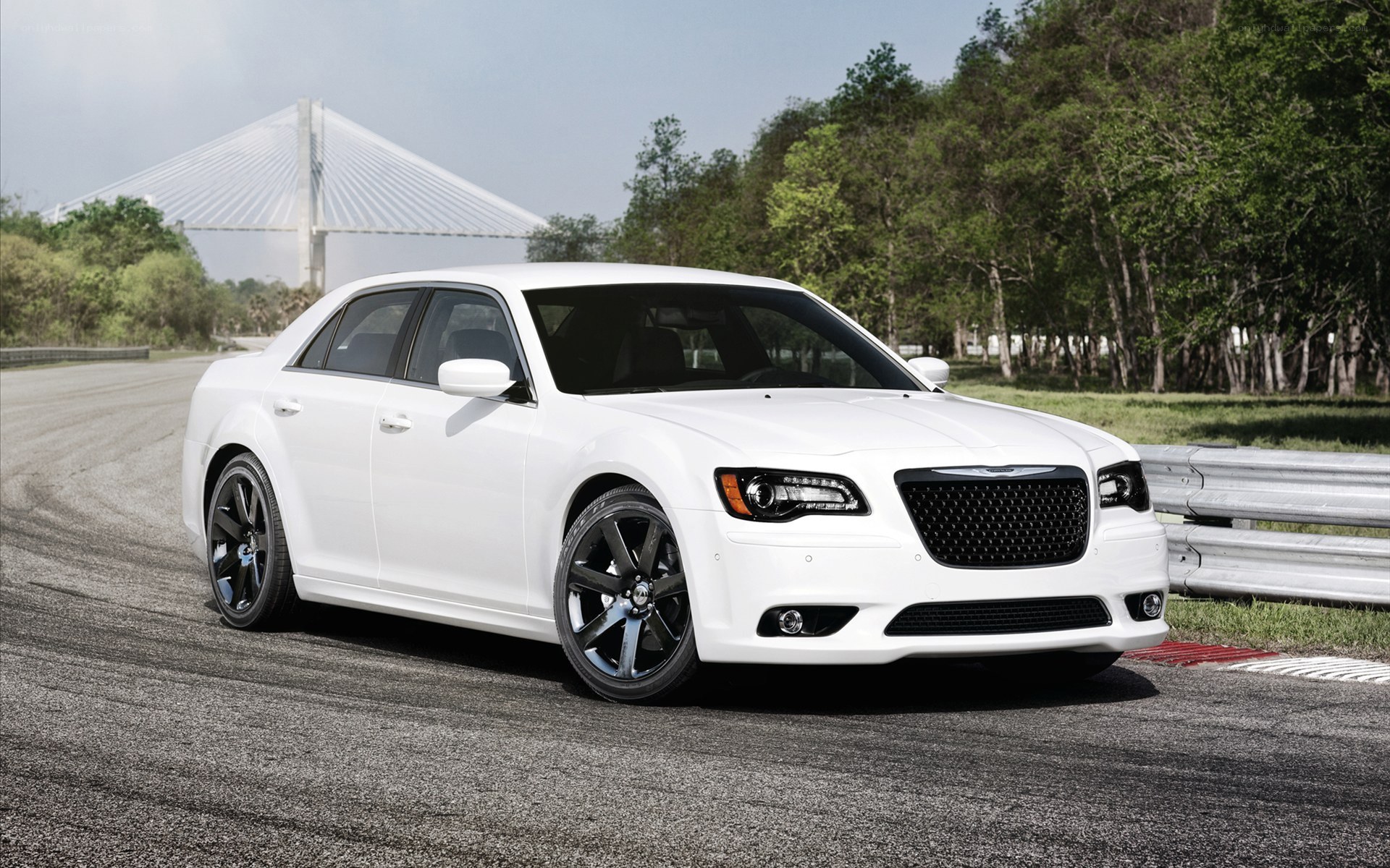 White Chrysler on a racetrack