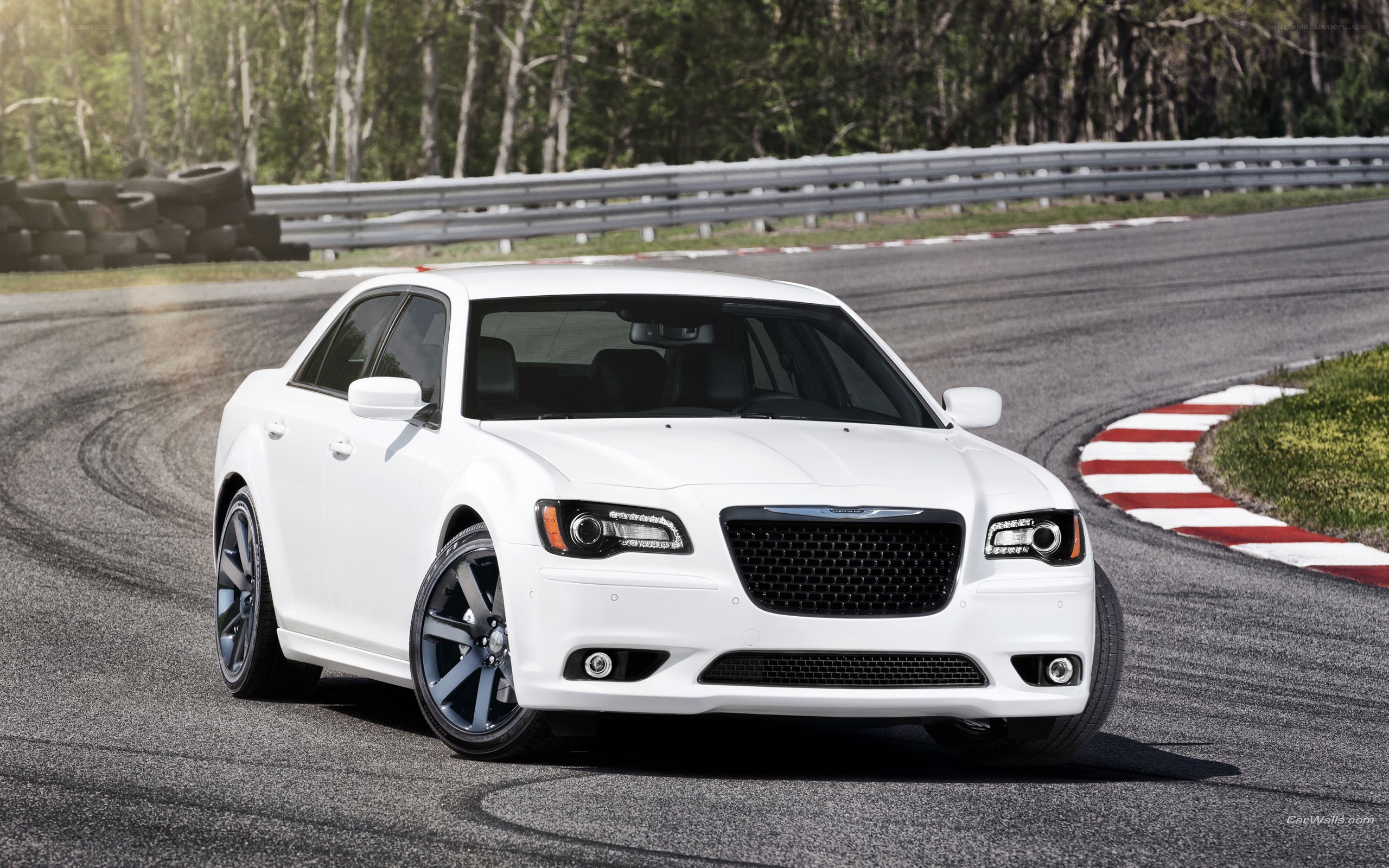 white chrysler on racetrack