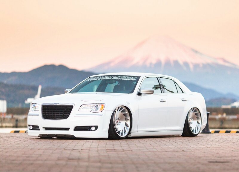 White Chrysler Sedan — Serene