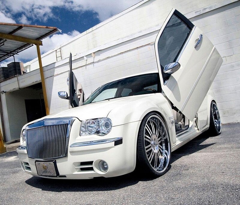 white chrysler with gullwing doors