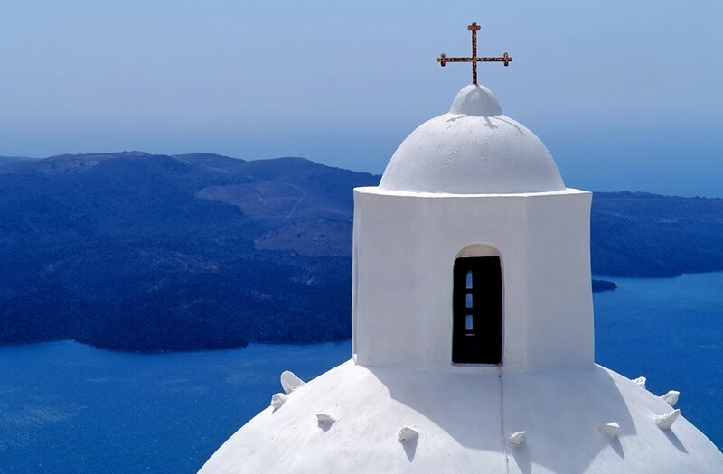 White church dome overlooking the sea