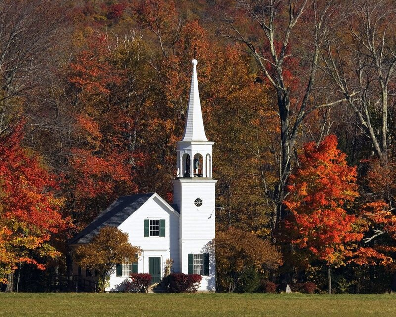 White church in autumn forest