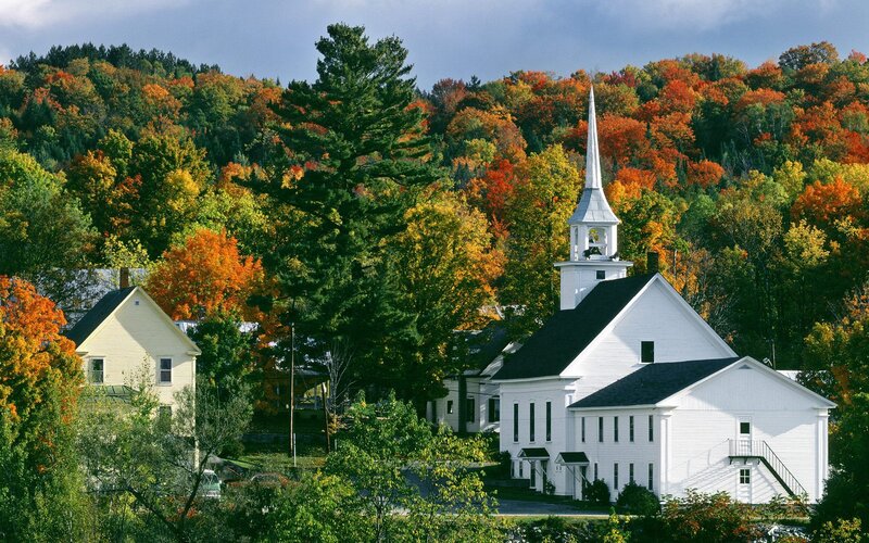 White church in autumn village