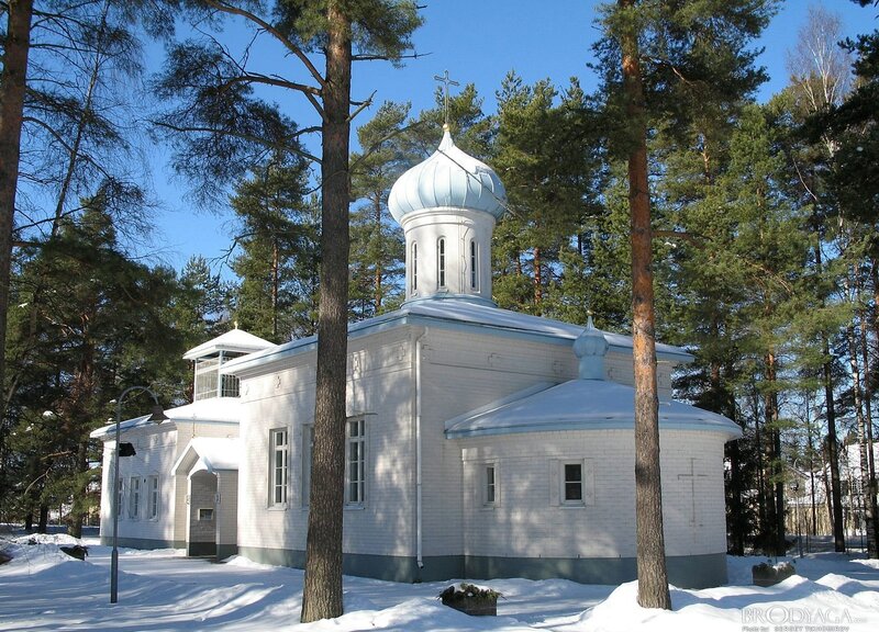 White church in snowy forest