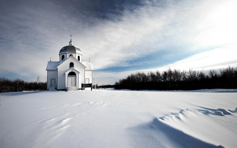 White church in snowy landscape