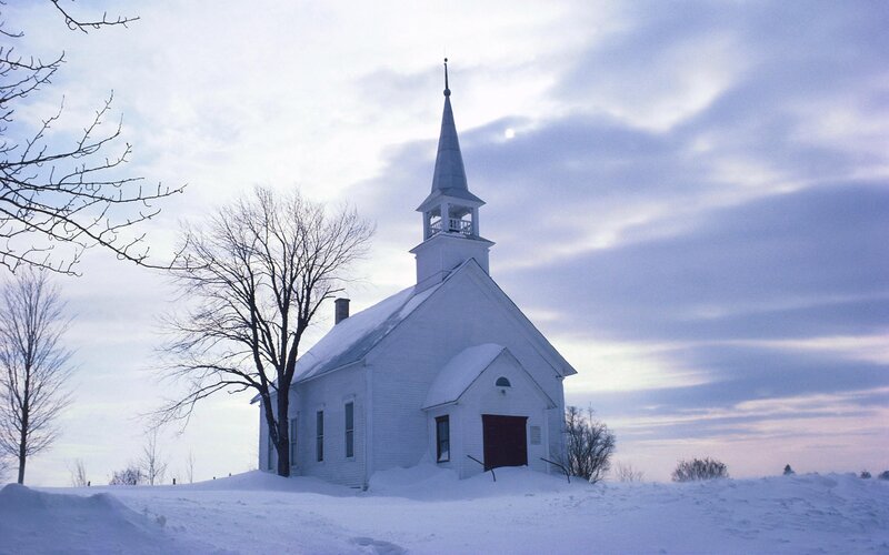 White church in snowy landscape