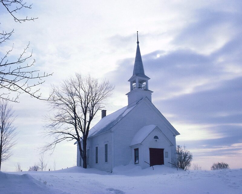 White church in winter landscape