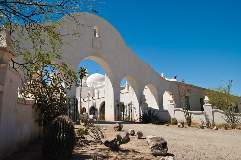 White church with arches in desert