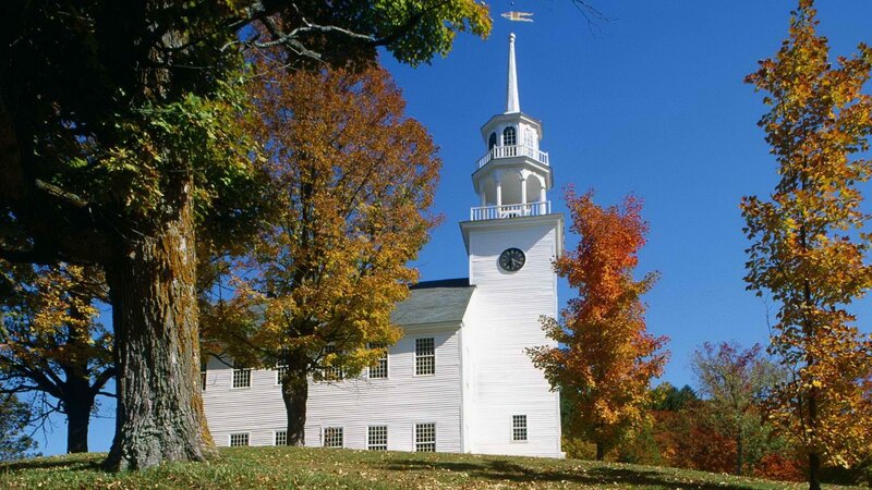 White church with autumn trees
