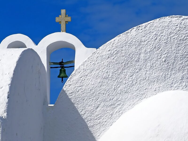 White church with bell and cross