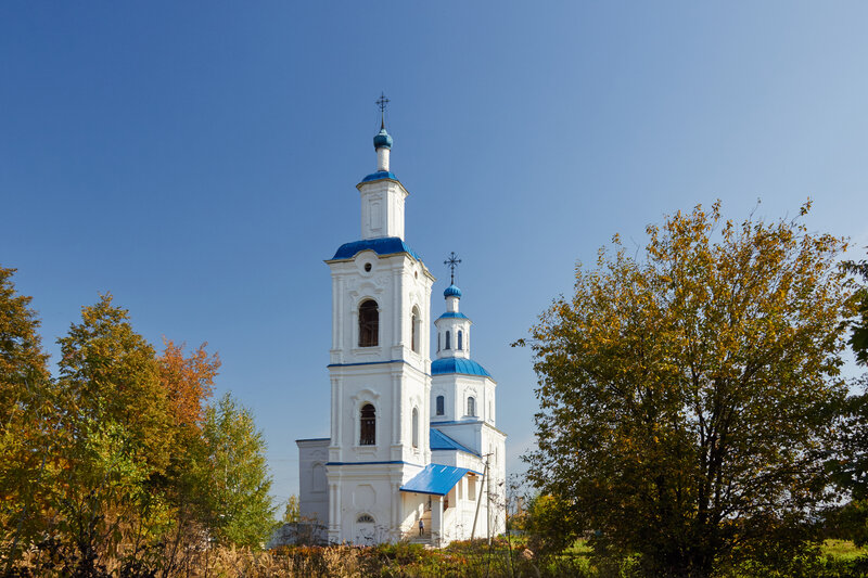 White Church with Blue Domes — Serene, Autumn