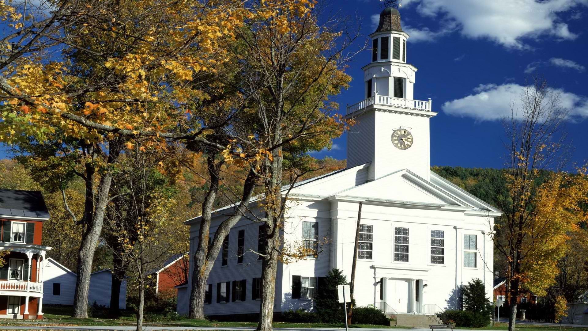 white church with clock tower
