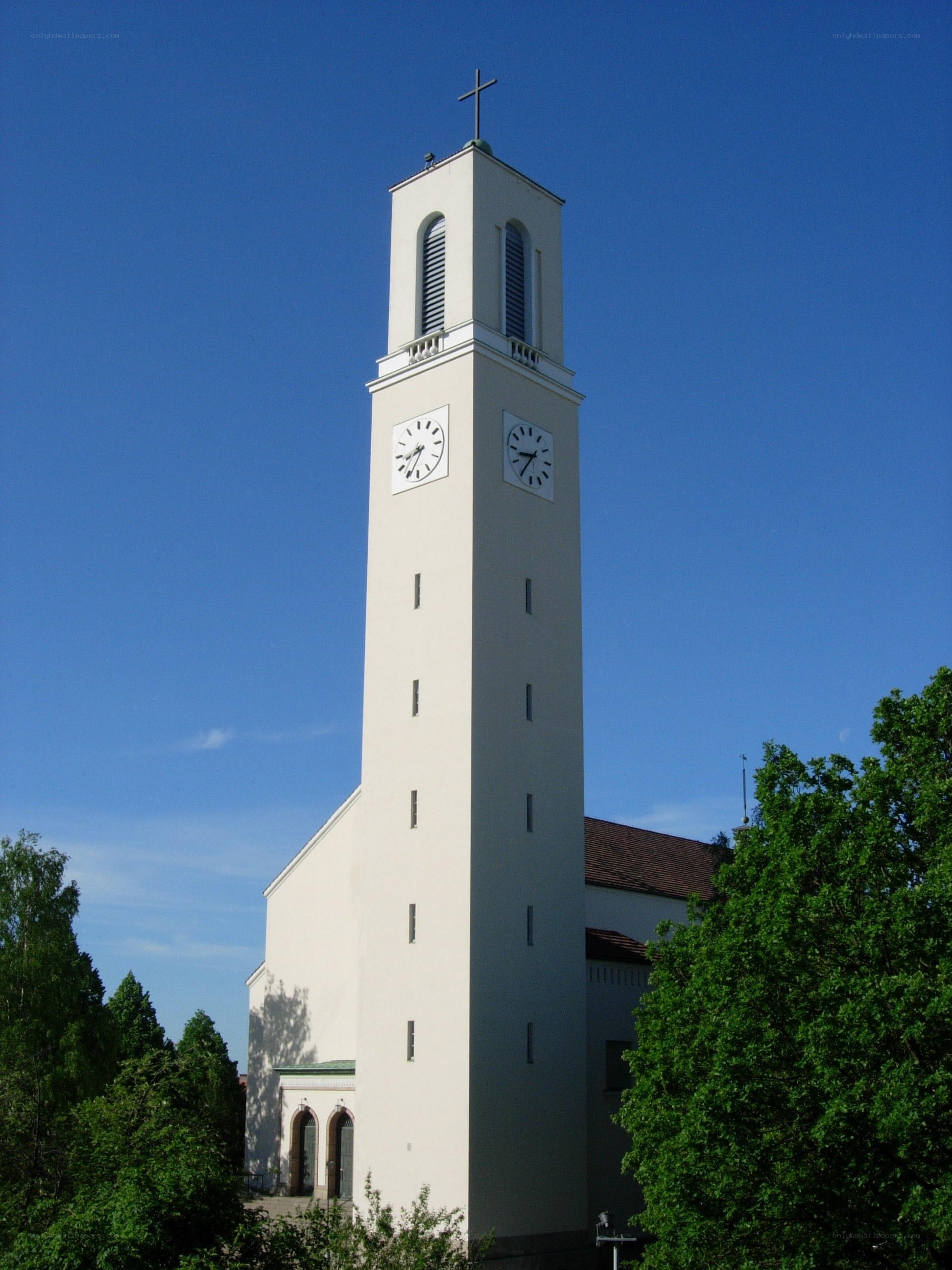 White church with clock tower