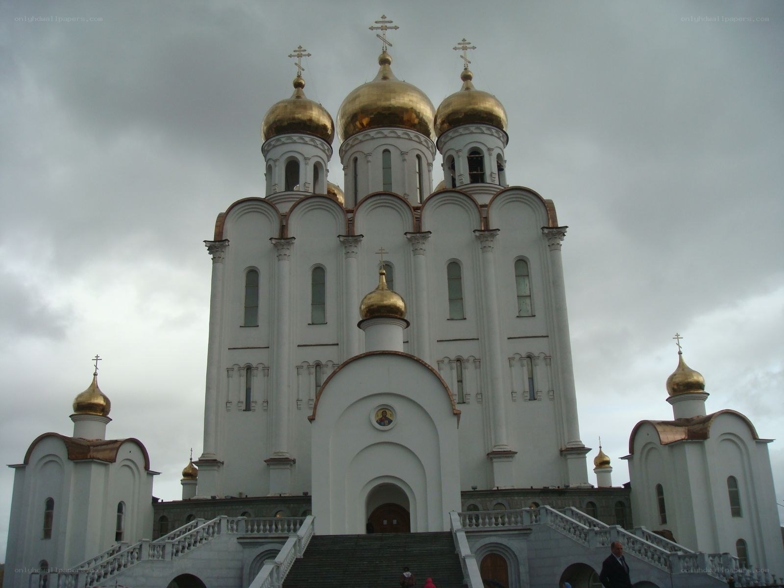 White church with golden domes