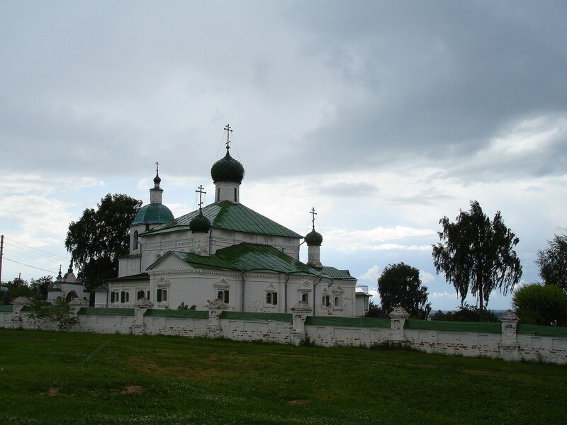 White church with green domes