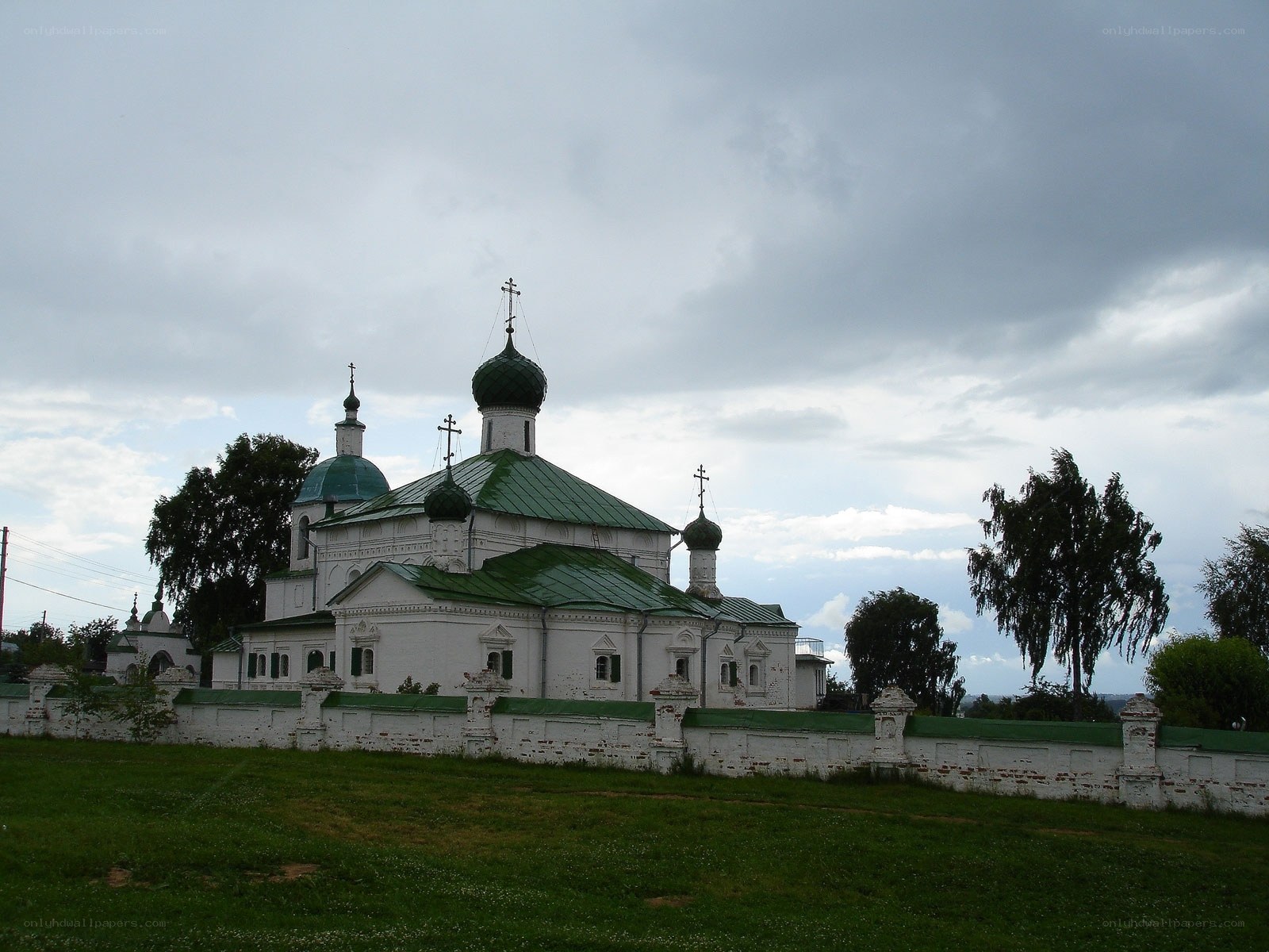 White church with green domes