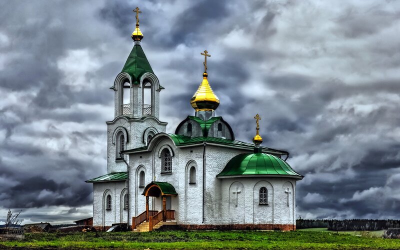 White Church with Green Roofs