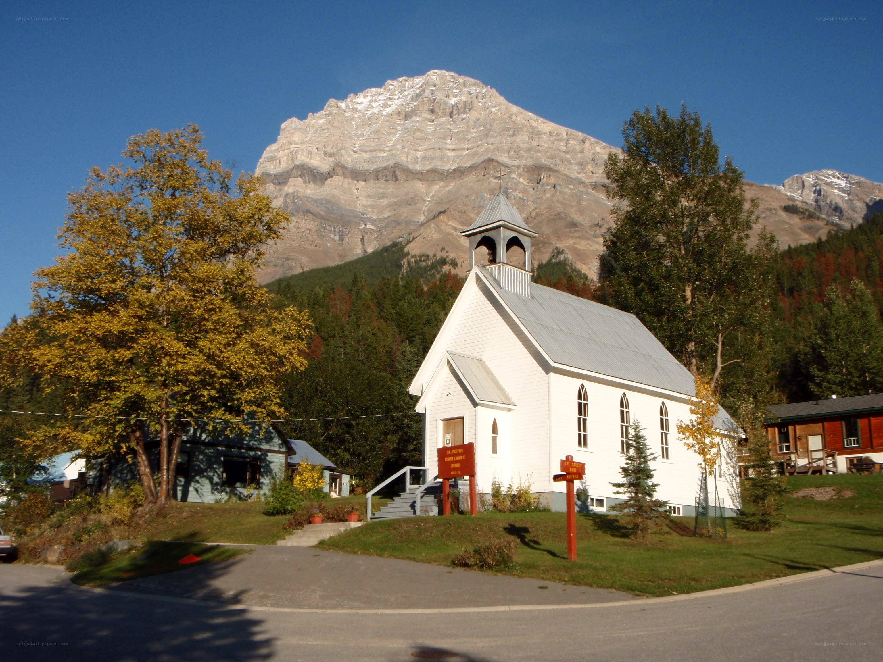 White church with mountain backdrop