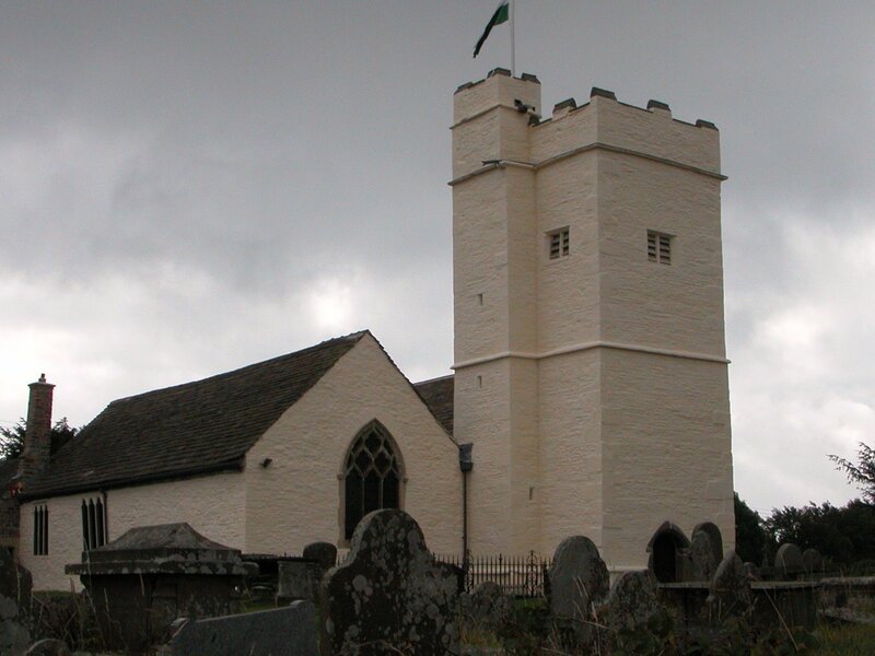 white church with stone tower