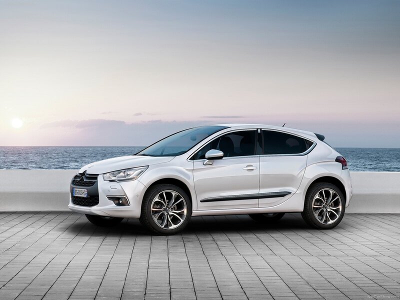 White Citroën DS4 by the sea