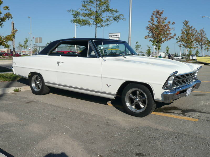 White Classic Car — Calm, Afternoon, Photograph, Parking Lot