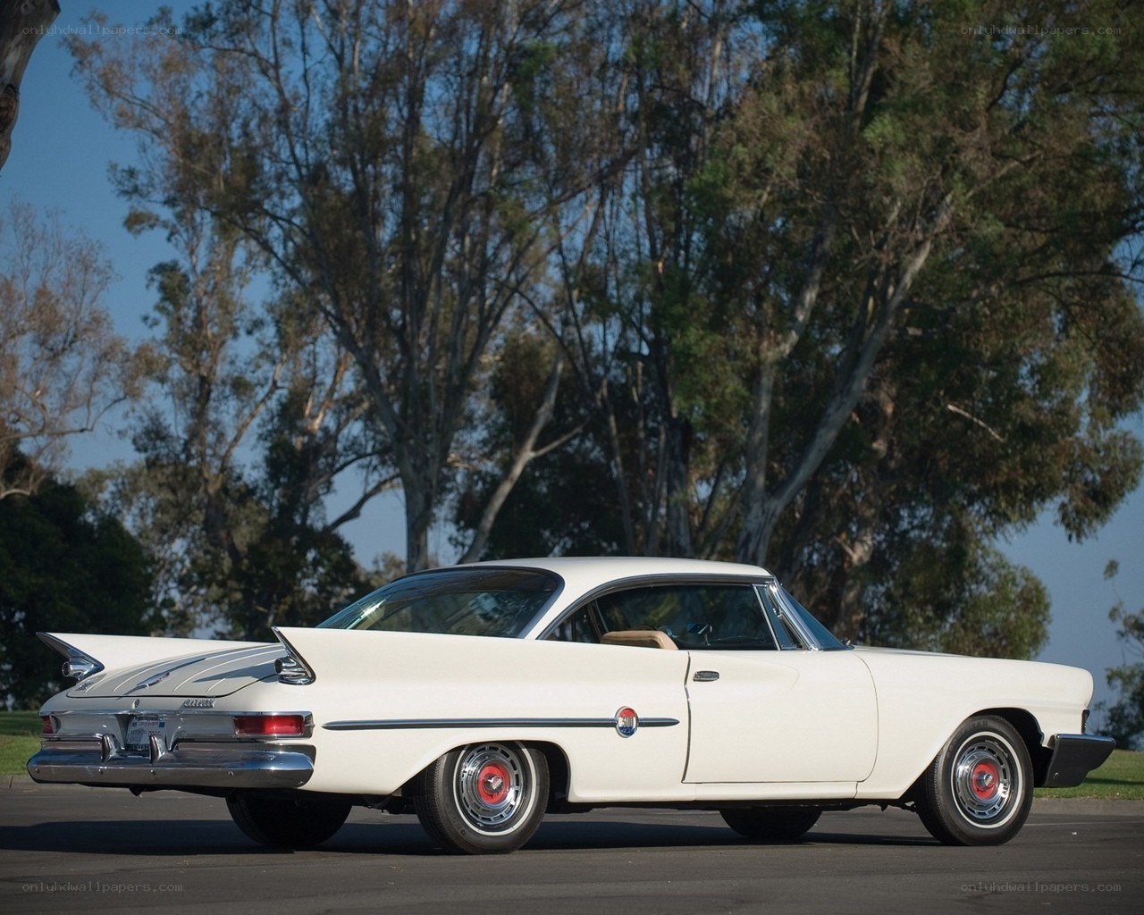 white classic car in park