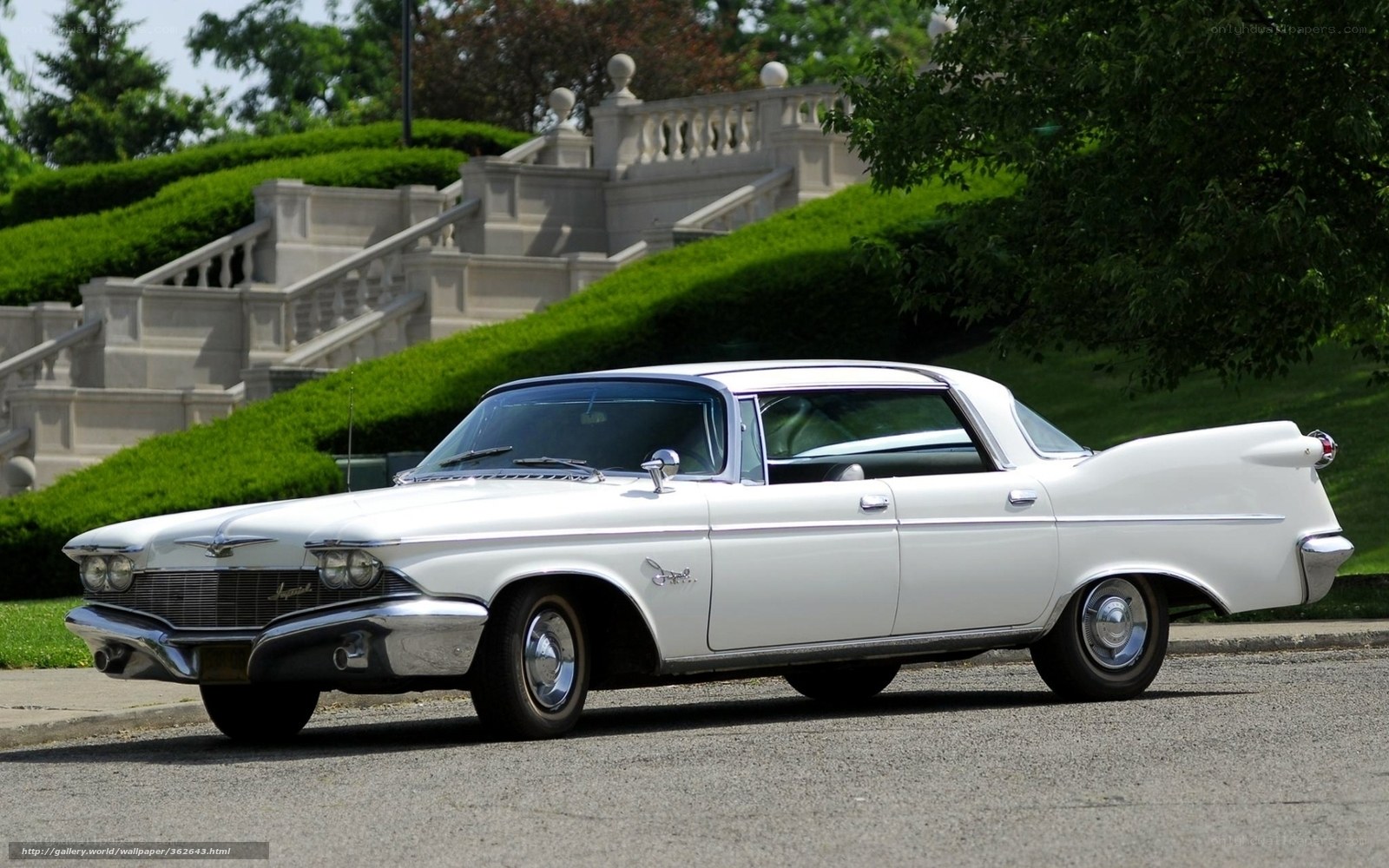 White classic car on a street