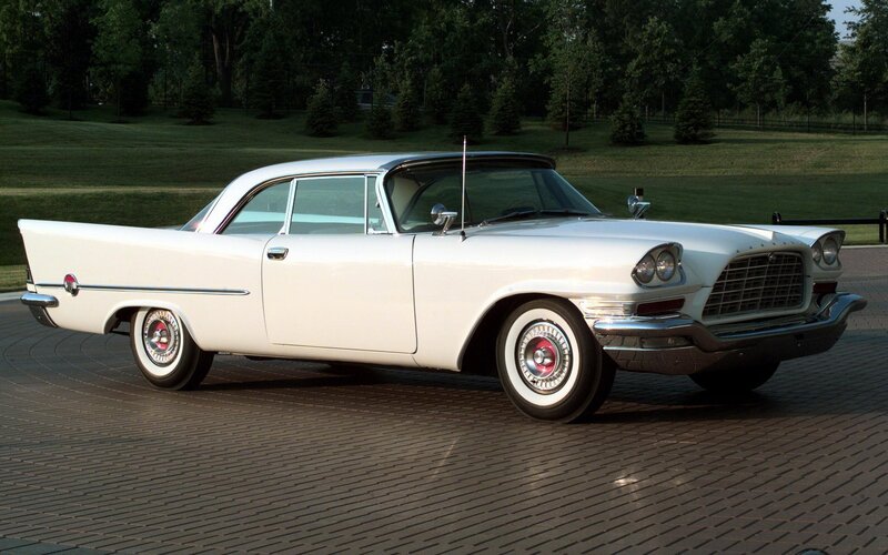 white classic car on display