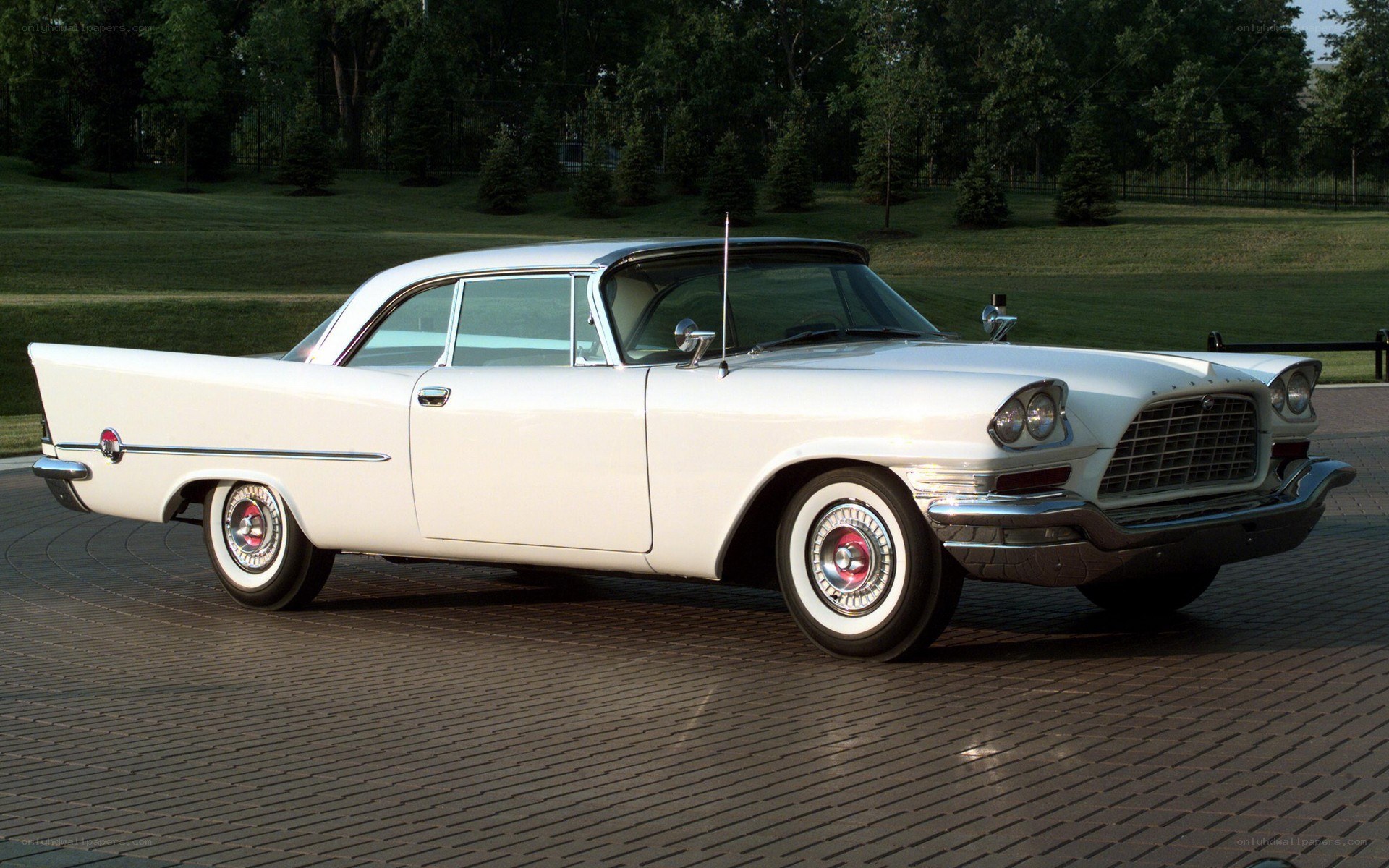 white classic car on display