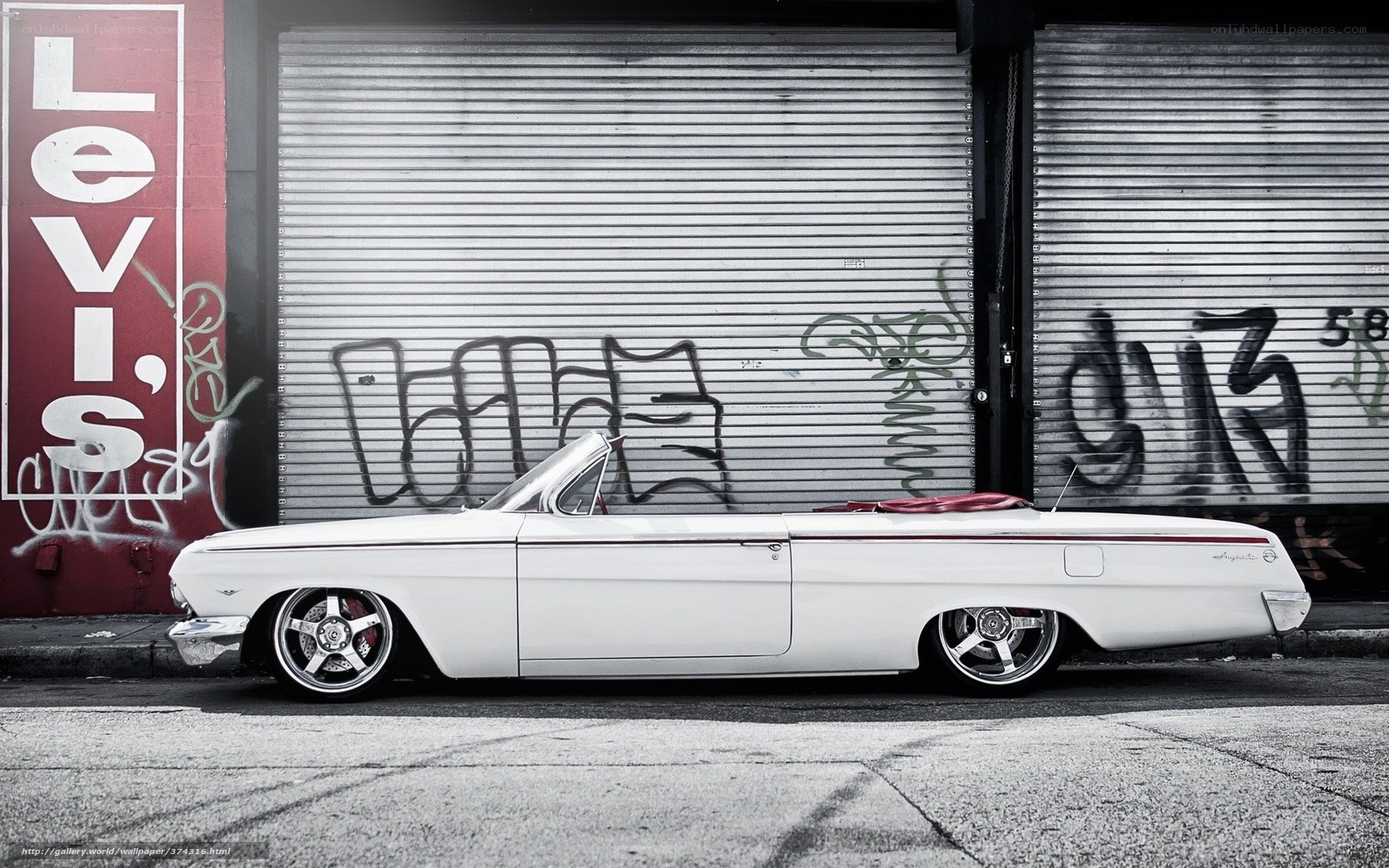White classic car on street