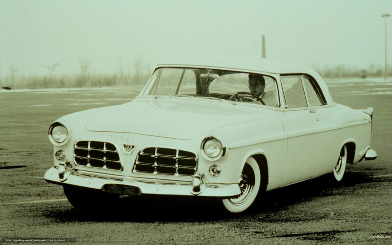 White classic car on test track