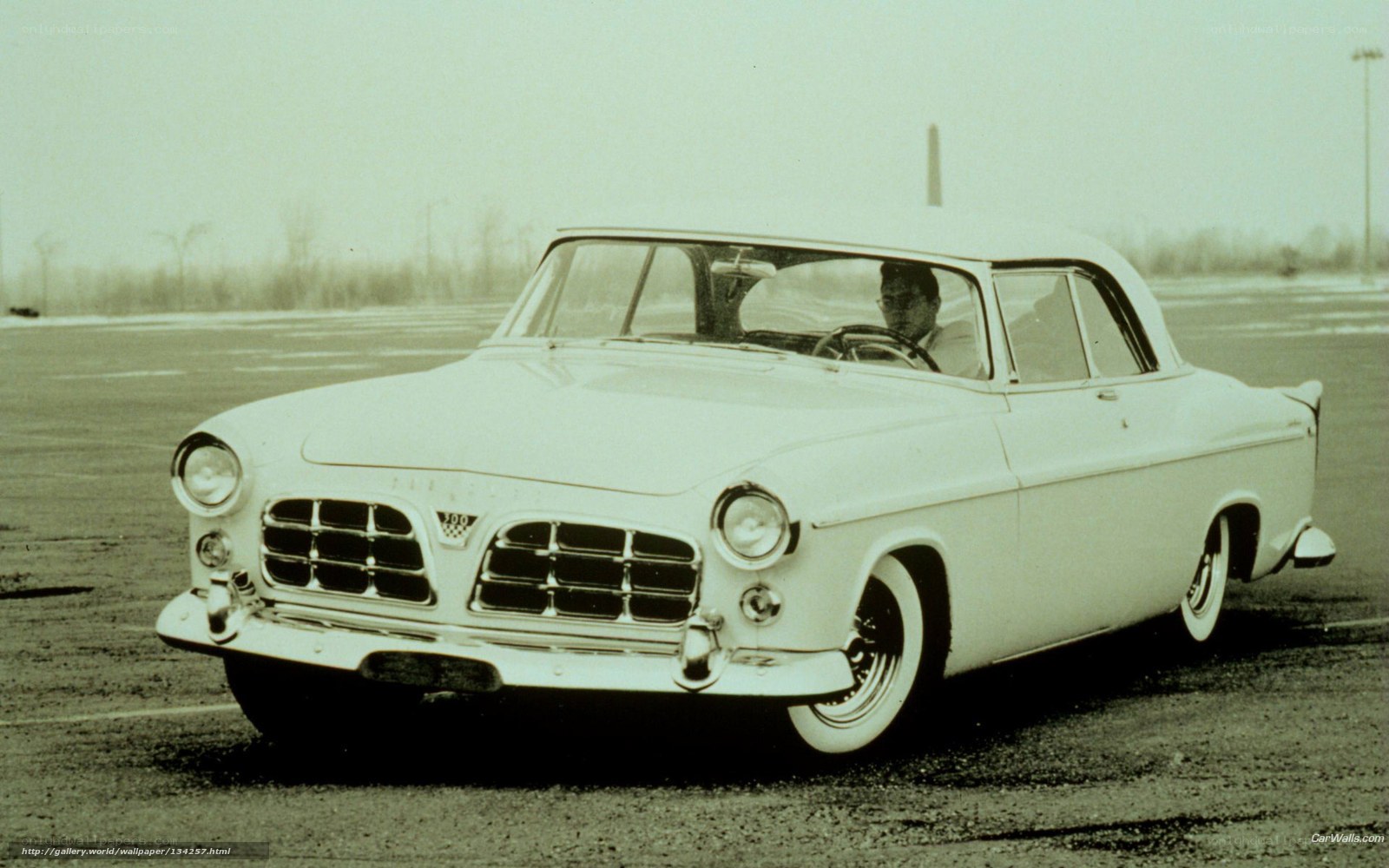 White classic car on test track