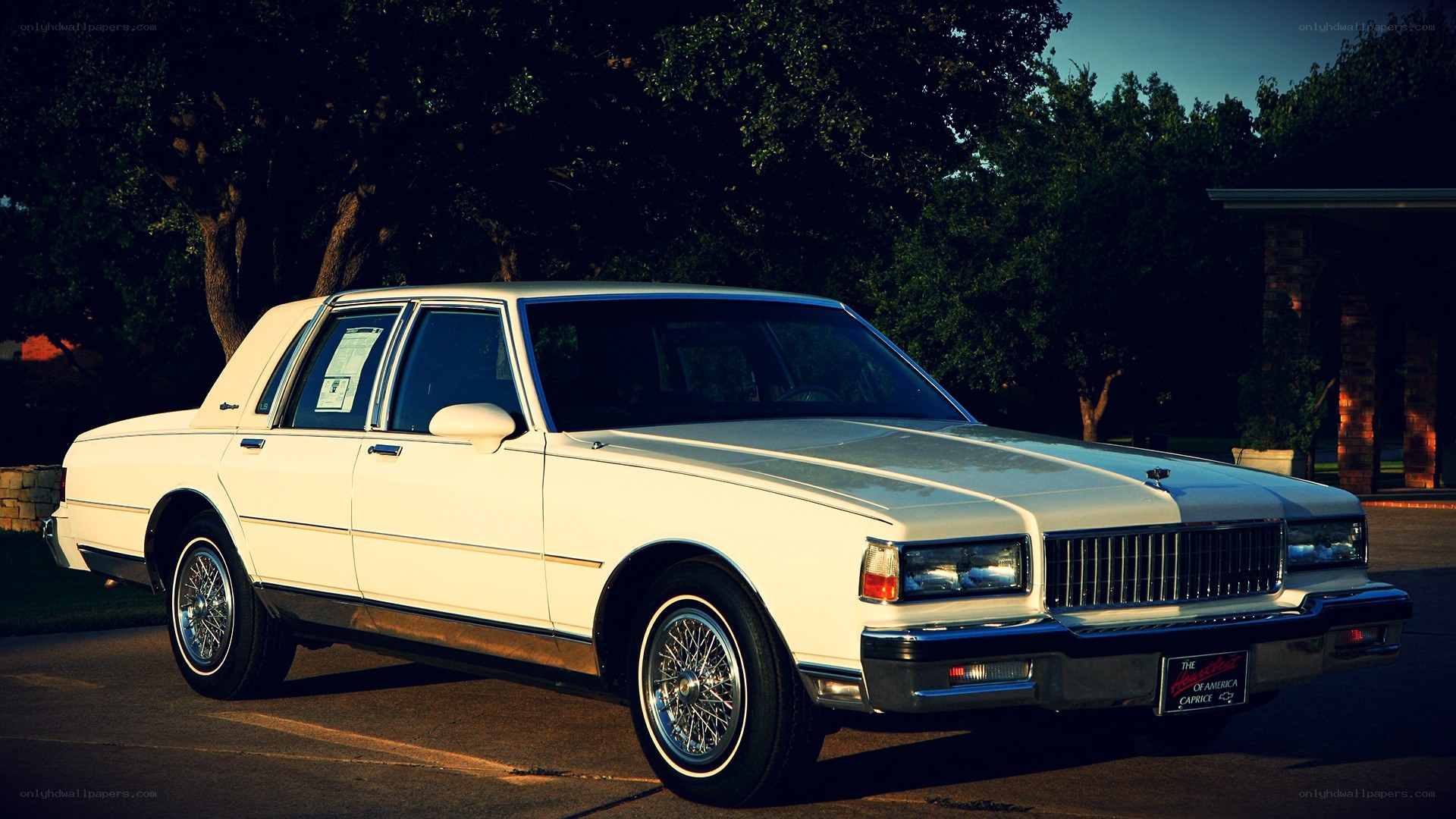 white classic car parked outside