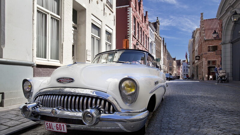 White Classic Car — Serene, Afternoon, Photograph, Cobblestone Street
