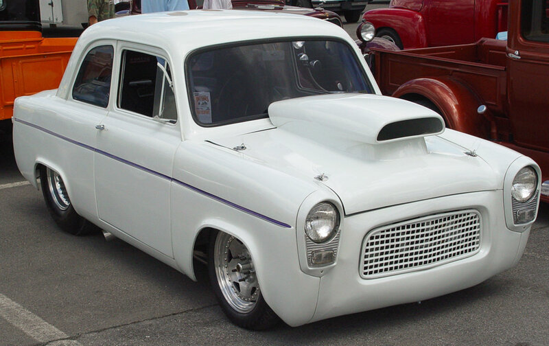 white classic car with hood scoop