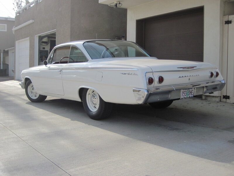 white classic chevrolet car
