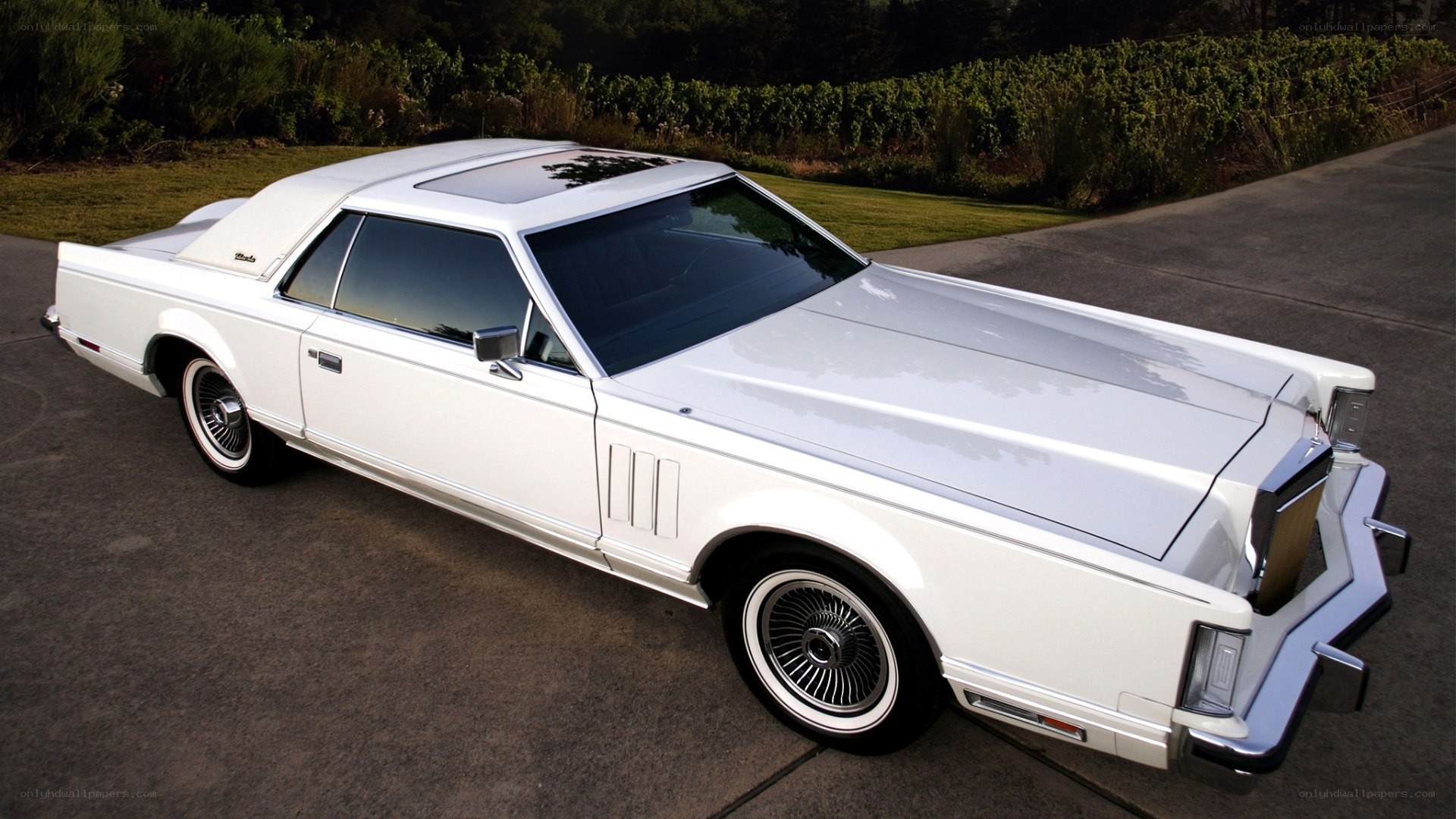white classic lincoln coupe