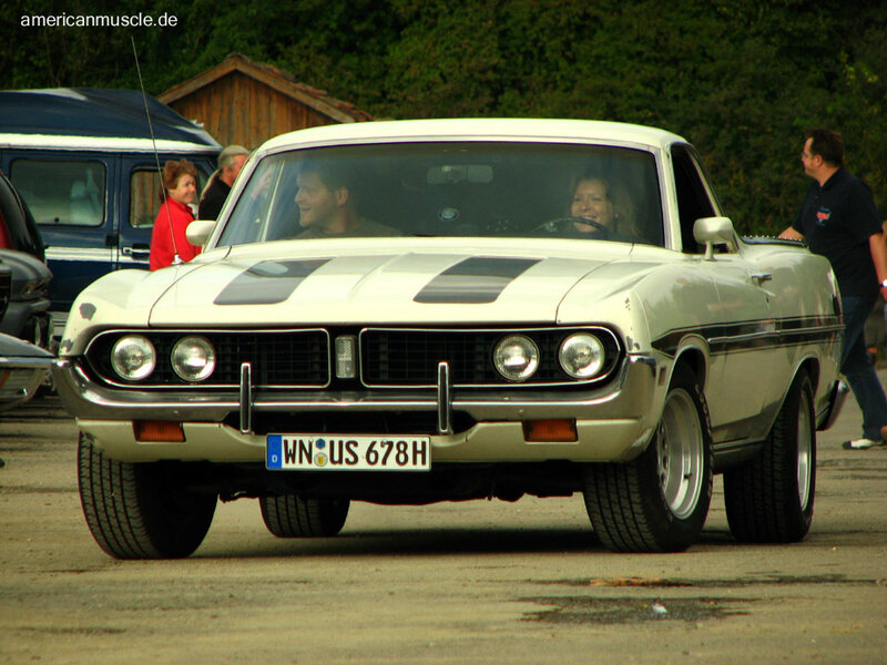 White classic muscle car at event