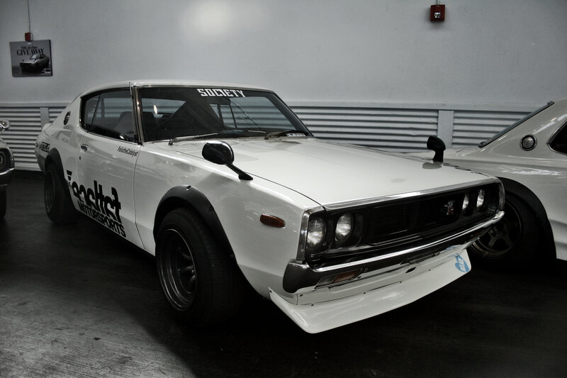White classic sports car in garage
