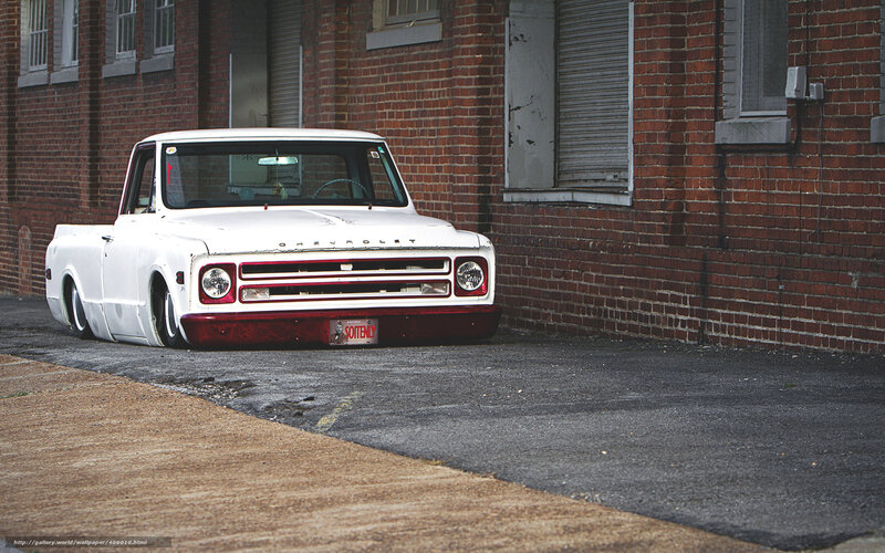 white classic truck in alley